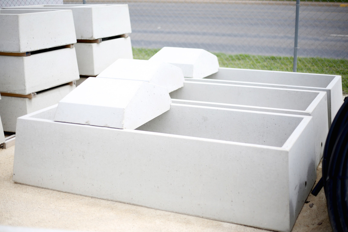 Precast concrete livestock water trough for farm and ranch applications