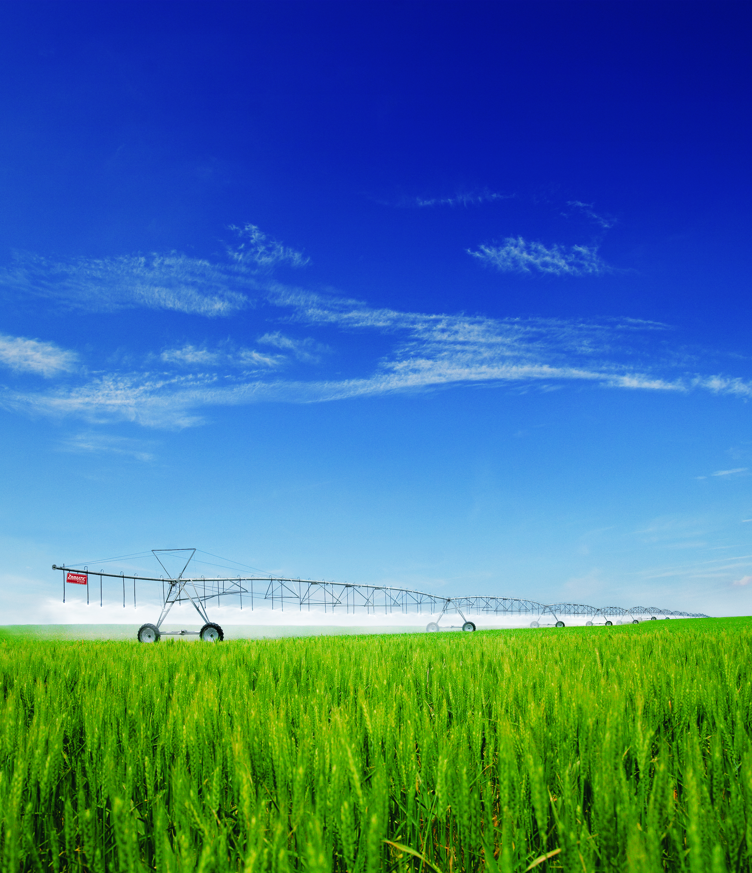 Zimmatic center pivot irrigation system in a wheat field