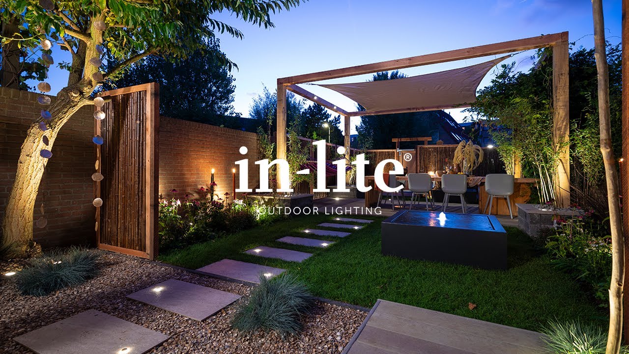 premium in-lite landscape lighting illuminating trees, gardens, patio and outdoor living space